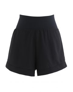 Shorts deportivos con cintura entrecruzada en negro